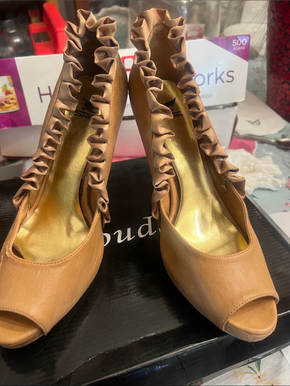 Nude peep-toe heels with the ruffle detail